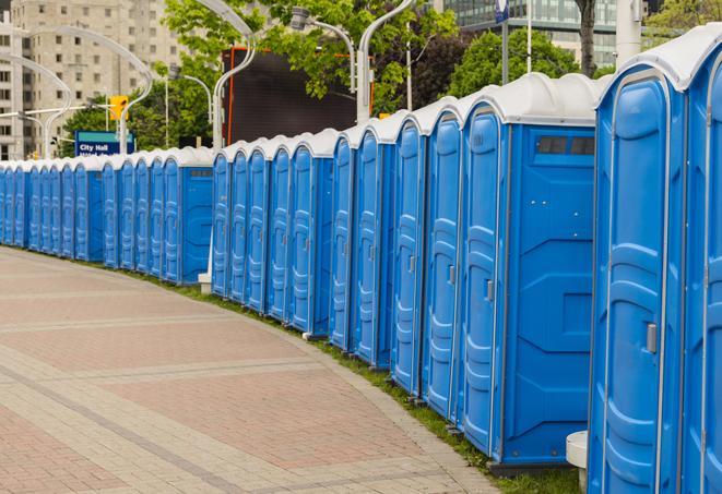 a line of portable restrooms at an outdoor wedding, catering to guests with style and comfort in Huntington Park, CA